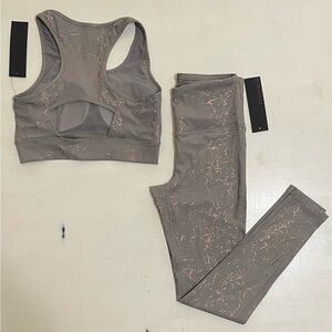 Mono B bra and legging set. Dark gray with bronze accents